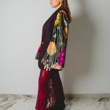 Brown upcycling vintage men's jacket with modified sleeves in floral furnishing fabric