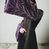 Green upcycling vintage men's jacket in wool and cashmere with modified sleeves in purple and silver sequins