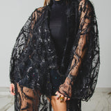 Long tailored kimono in black sequins with embroidered flowers