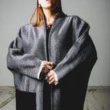 31 CAPPOTTO KOMOREBI CON FANTASIA BIANCA E NERA IN TESSUTO EFFETTO PAGLIA E TASCHE A CONTRASTO NERE