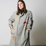 Vintage upcycling grey trench coat with reglan sleeve and bronze rhinestones with hand painted illustration