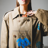 Vintage upcycling trench coat with raglan sleeves and cape with rhinestones and hand-painted illustration - size 50/52