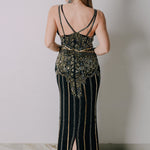 Vestito lungo decorato con spalline sottili, color oro e nero tg42
