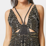 Vestito lungo decorato con spalline sottili, color oro e nero tg42