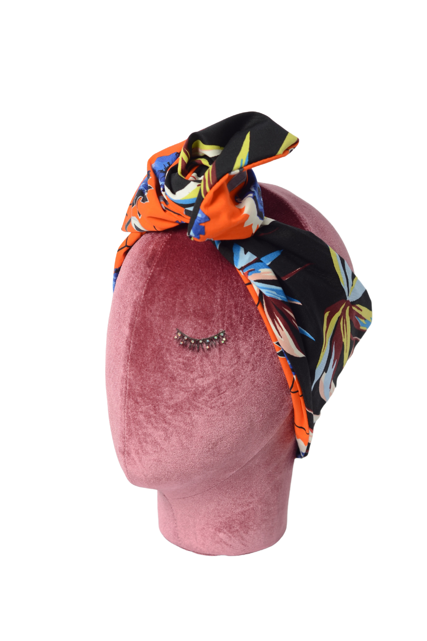 Fascia modellabile per capelli in cotone nero/arancione doubleface con fantasie