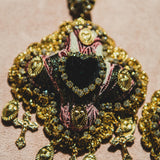 Body necklace with cascading chains - in gold-colored steel