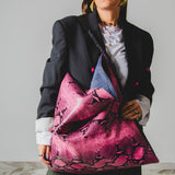 8 - NOMAD PINK PYTHON – Borsa Maxi Reversibile in Pelle Stampa Pitonata Rosa e Nera e Pelle Nera